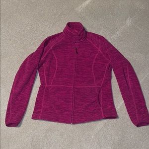 Pink women’s North Face zip up.